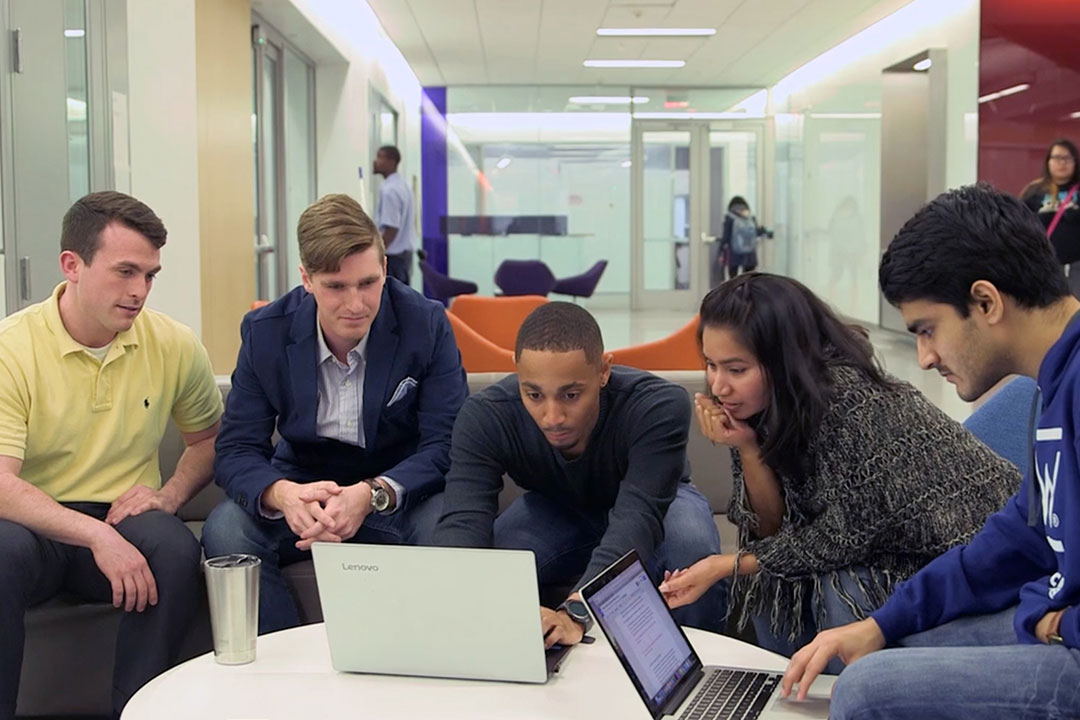 5 students working together on a Data Science project